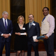 Robert Moore of the Daily News in New York (right), with Sarah Ryley, formerly of the News, and Eric Umansky of ProPublica, accepts the 2017 Pulitzer Prize for Public Service from Columbia University President Lee C. Bollinger (left). The award was for uncovering, primarily through Ryley’s work, widespread abuse of eviction rules by the police to oust hundreds of people, most of them poor people of color. The News and ProPublica jointly published the story. (pulitzer.org)